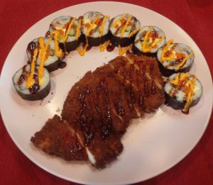 Dish of Chicken cutlet called Katsu served with kimbap.